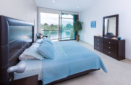 Puerto Aventuras Condominio | Gorgeous 3 Bdrm Lagoon Condo Pool Wifi Kayak paddle boards Golf Cart Available