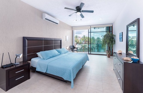Puerto Aventuras Condominio | Gorgeous 3 Bdrm Lagoon Condo Pool Wifi Kayak paddle boards Golf Cart Available