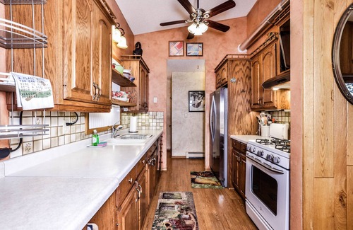 Lake Tomahawk Casa | Gorgeous 5 bedroom home on Two Sisters Lake with direct snowmobile access!