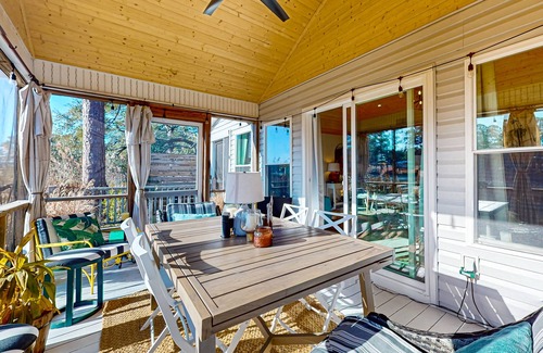 Shallotte Casa | Gorgeous creekside cottage with firepit, board games, dock, deck, & washer/dryer