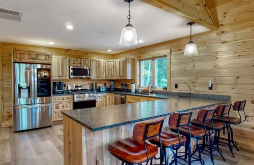 Carrabassett Valley Cabina | Gorgeous dog-friendly cabin with great view, deck, hot tub, & gas fireplace