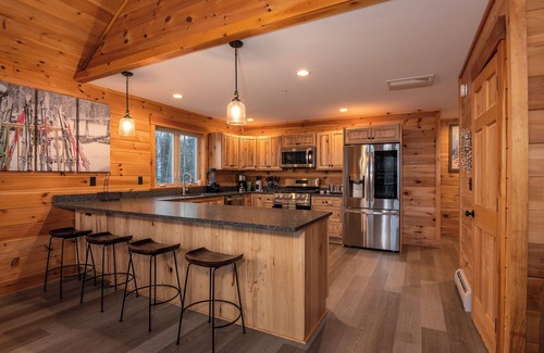 Carrabassett Valley Cabina | Gorgeous dog-friendly cabin with great view, deck, hot tub, & gas fireplace