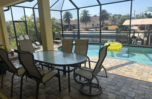 Saint James City Casa | GORGEOUS HOME WITH HEATED POOL ON WATER AND COMMUNITY BOAT RAMP