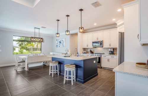 Trafalgar Casa | Gorgeous home with heated pool, lanai, grill, and washer/dryer