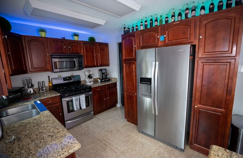 Tropic Casa | Gorgeous Urban Oasis W/hot Tub, Heated Pool And Private Movie Theater 3 Bedroom Home by RedAwning