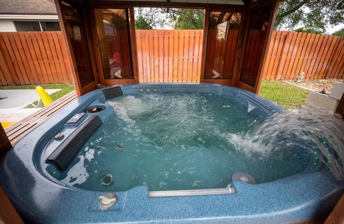 Tropic Casa | Gorgeous Urban Oasis W/hot Tub, Heated Pool And Private Movie Theater 3 Bedroom Home by RedAwning