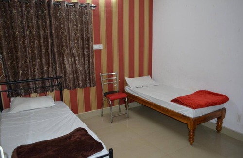 Yeshwanthpur Hotel | Goroomgo Garden Home Stay Bengaluru