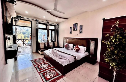 Banikhet Hotel | Goroomgo Sahara Inn Dalhousie