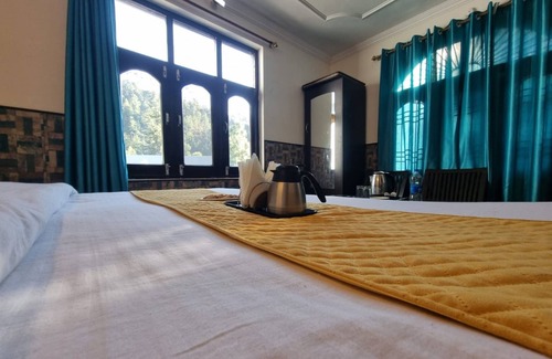 Banikhet Hotel | Goroomgo Stay Well Chamba
