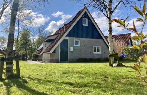 Anjum Casa | Grachthaus 6pers House with a private terrace and garden by the Lauwersmeer