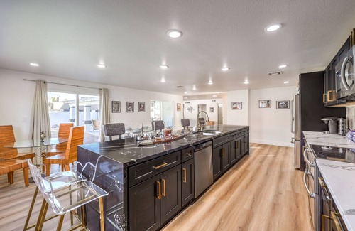 Paradise Casa | Grand 5BR/4BA Pool Home: Sleeps 14 & Perfect for Families near Strip!