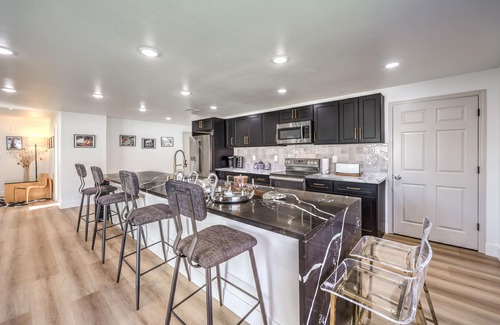Paradise Casa | Grand 5BR/4BA Pool Home: Sleeps 14 & Perfect for Families near Strip!