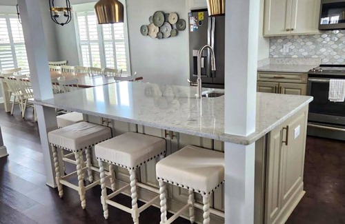 Ocean Isle Estates Casa | Grand beach home with elevator, private hot tub, game room, & pool access