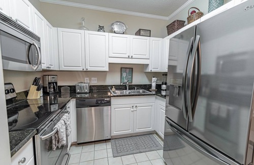 Vaught Condominio | Great Location minutes from Golfing & the Beach!