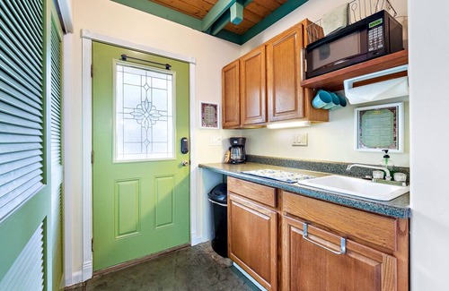 Holualoa Cabaña | Casa pequeña verde de Hawaii