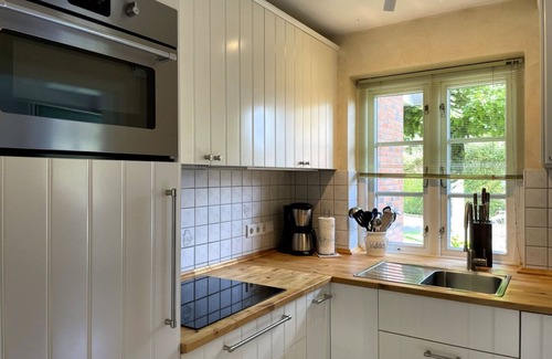 Wyk auf Foehr Apartamento | Green Eilun 13 - Modernes Reihenhaus mit Garten, Spielecke, Waldzugang und Nähe zum Südstrand