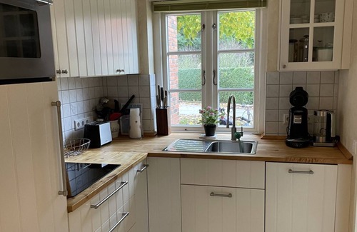 Wyk auf Foehr Apartamento | Green Eilun 13 - Modernes Reihenhaus mit Garten, Spielecke, Waldzugang und Nähe zum Südstrand