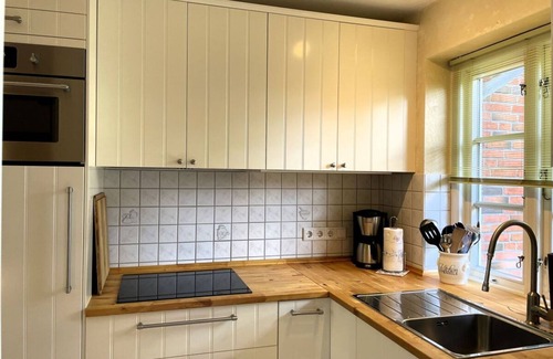 Wyk auf Foehr Apartamento | Green Eilun 13 - Modernes Reihenhaus mit Garten, Spielecke, Waldzugang und Nähe zum Südstrand