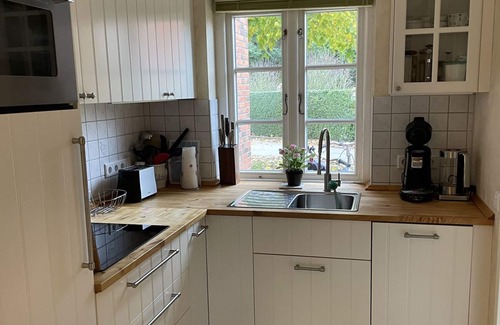 Wyk auf Foehr Apartamento | Green Eilun 13 - Modernes Reihenhaus mit Garten, Spielecke, Waldzugang und Nähe zum Südstrand