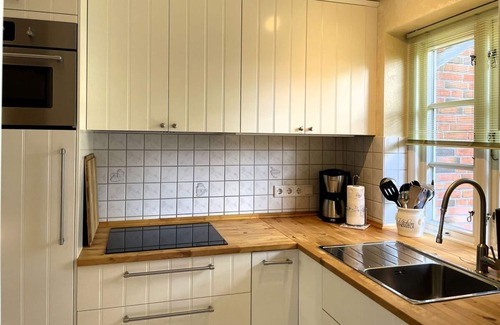 Wyk auf Foehr Apartamento | Green Eilun 13 - Modernes Reihenhaus mit Garten, Spielecke, Waldzugang und Nähe zum Südstrand