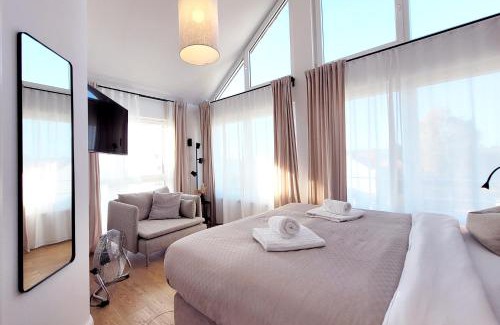 Sierksdorf Apartamento | Große Penthouse Ferienwohnung mit Meerblick, Sonnenterrasse & Luxusbad von "Momentic"