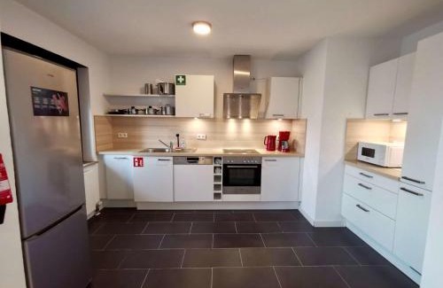 Lampertheim Apartamento | Großzügige Monteurwohnungen mit perfekter Verkehrsanbindung und Parkplatz