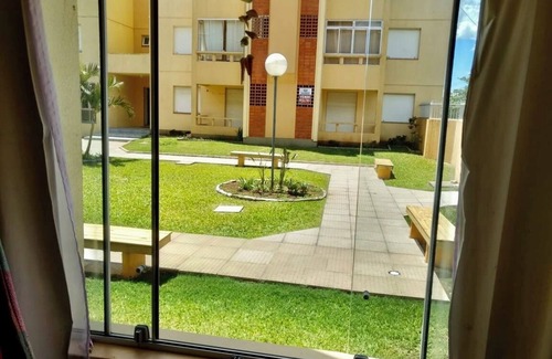 Capao da Canoa Apartamento | Ground floor apartment with garden view