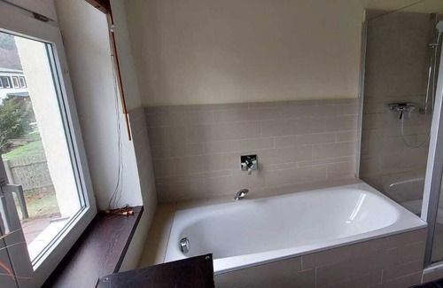Friedrichroda Condominio | Ground floor apartment with parquet, fireplace, terrace and garden