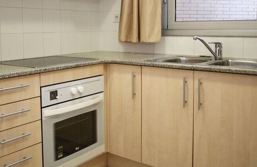 Torredembarra Apartamento | Apartamento en planta baja a 80m de la playa con piscina y WiFi en Torredembarra
