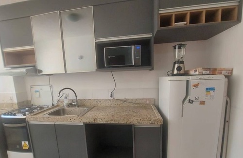 Macae Apartamento | Ground floor apartment with private area and lawn
