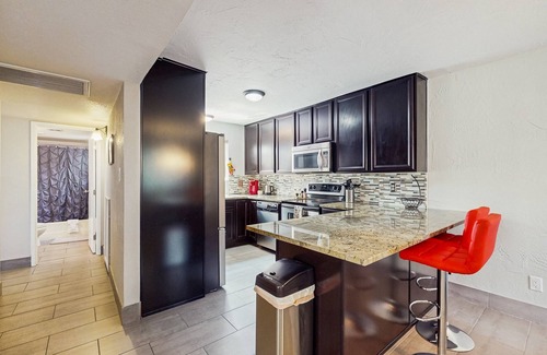 Security Acres Condominio | Ground floor condo w/ private patio & direct access to shared pool, dog-friendly
