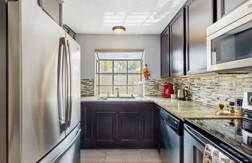 Security Acres Condominio | Ground floor condo w/ private patio & direct access to shared pool, dog-friendly