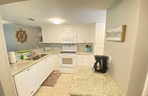 Point East Condominio | Ground Floor Ocean & Pool View Condo