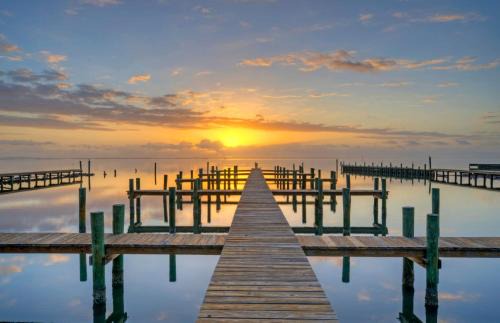 Flour Bluff Casa | Group Getaway w Pool, Boat Dock 2 Homes Laguna Village Retreat by AvantStay