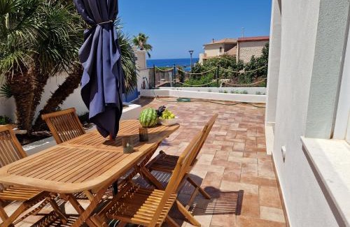 Portoscuso Apartamento | Guest House Sunset on the sea