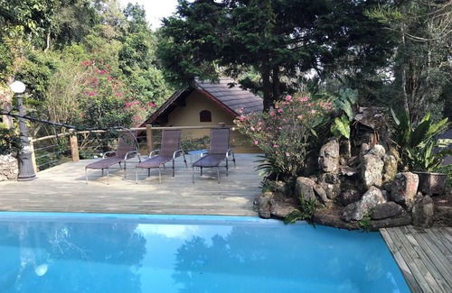 Monte Verde Cabaña | Guest house with 2 bedrooms, living room and open kitchen, with swimming pool and beautiful garden