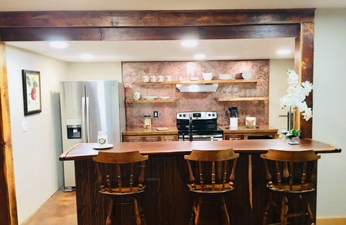 Missoula Casa | Guest suite attached to log home in the FOREST