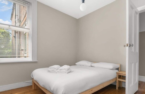 William Morris Apartamento | GuestReady - A beautiful home with garden
