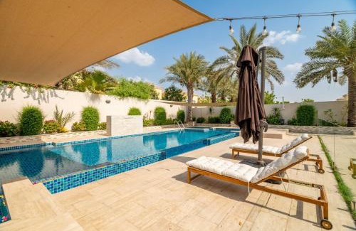 Jumeirah Park Apartamento | GuestReady - Peaceful Garden Villa l Pool & BBQ