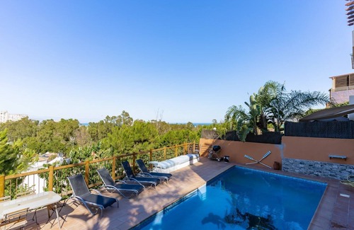 Torremolinos Chalet De Esquí | GuestReady - Poolside Paradise in the Suburbs 2