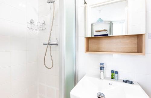 Quartier Sainte-Avoye Apartamento | GuestReady - Stylish Escape in Folie-Méricourt