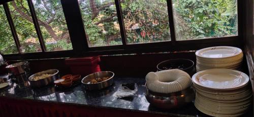 Khattalwada Hotel | Gujarati resort park view matheran