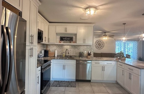 Pelican Casa | Gulf access pet friendly waterfront oasis with NEW heated salt water pool & spa