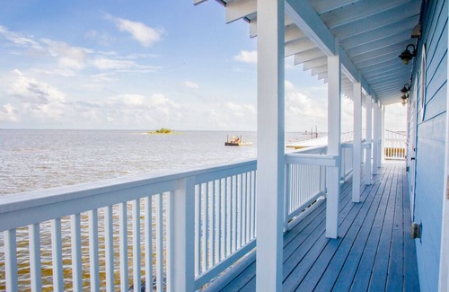 Horseshoe Beach Casa | ¡Ubicación frente al golfo con increíble acceso directo a la vista del amanecer en el canal de aguas profundas!