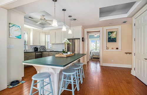 Beachside Village Casa | Gulf-view home with three balconies - walk to beach - central AC & private W/D