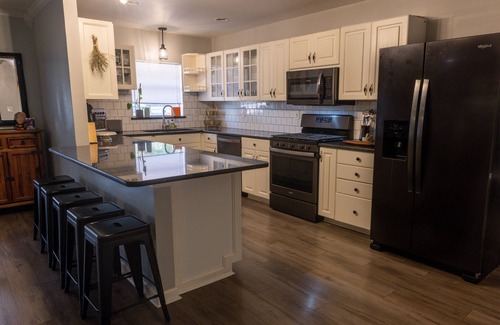 Wright Casa | Gulfside Allure: Stylish Decor, Large Yard, Ample Parking