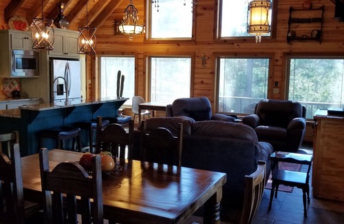Story Cabina | Gypsy Sunset cabin - gorgeous sunset views overlooking Lake Ouachita valley,