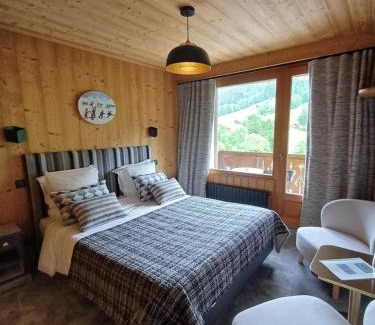 Le Grand-Bornand Hotel | Hôtel-Chalet Les Ecureuils Restaurant, Piscine, Jardin Garage