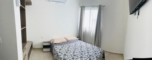 Centro Casa | Habitación con cama matrimonial