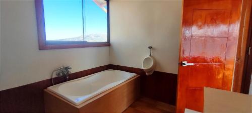 Puno Hotel | Habitación Vista a Ciudad de Puno